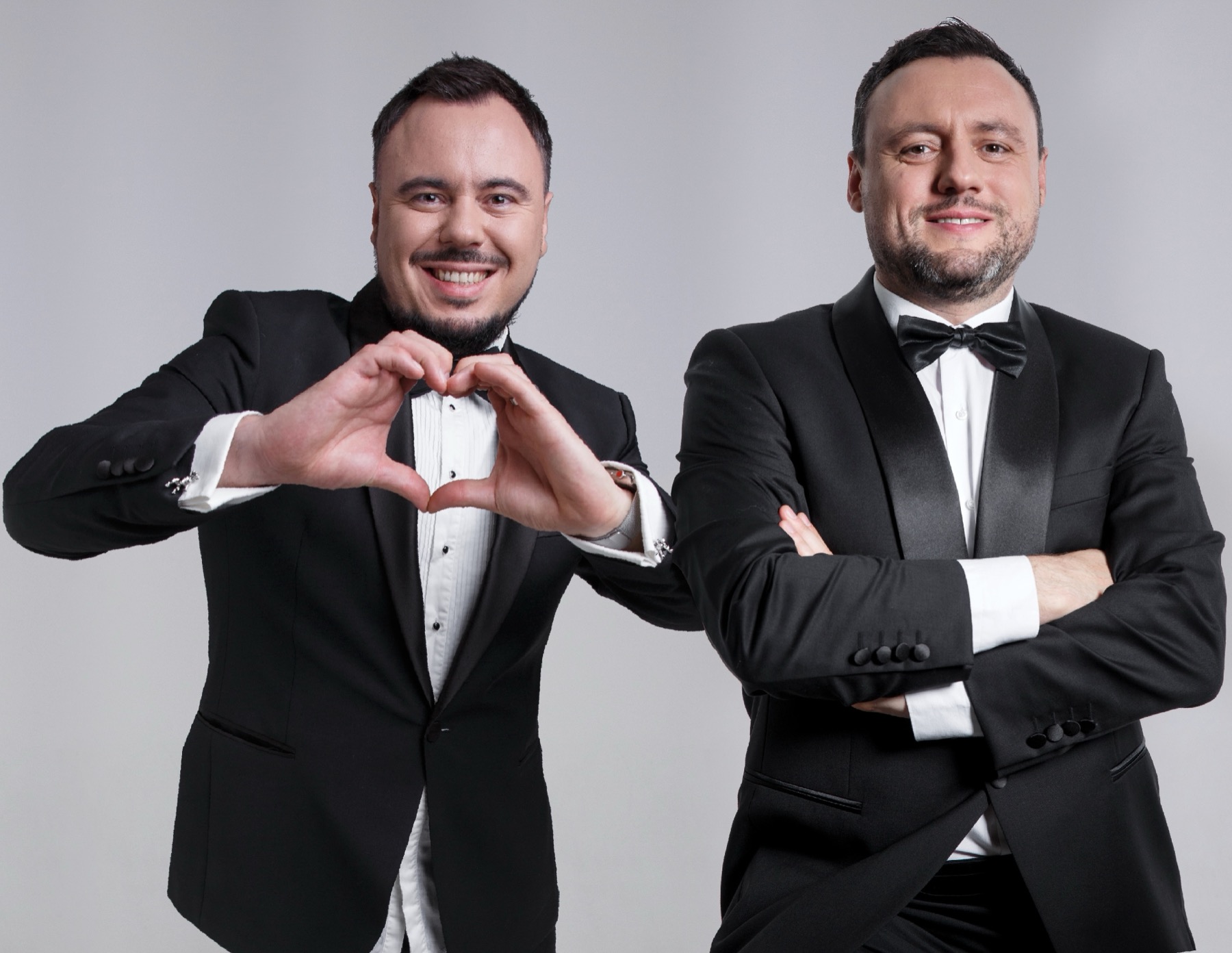 DJ Davay Brothers hosts in black tuxedos